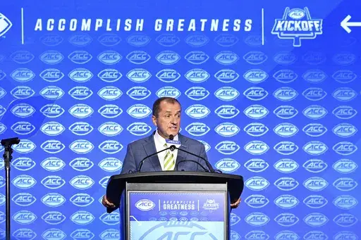 Atlantic Coast Conference commissioner Jim Phillips speaks during an NCAA college football news conference at the ACC media days, Monday, July 22, 2024, in Charlotte, N.C. (AP Photo/Matt Kelley, File)