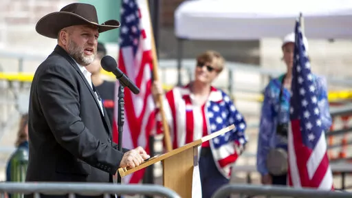 In this April 3, 2021, file photo, Ammon Bundy speaks to a crowd of about 50 followers in front of the Ada County Courthouse in downtown Boise, Idaho. A major Boise hospital was locked down for about an hour after far-right activist Bundy urged supporters to head there to protest a child protection case involving a family friend. St. Luke's Health System put the Boise Medical Center on lockdown Tuesday, March 15, 2022. (Darin Oswald/Idaho Statesman via AP, File)
