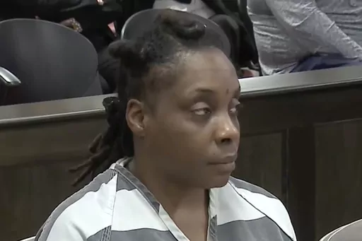 This image made from video provided by WAVE 3 News shows Dawn Coleman during her sentencing hearing, Tuesday, Nov. 21, 2023, at Washington Circuit Court in Salem, Ind. Coleman, of Louisiana, was sentenced Tuesday to 25 years in prison for her involvement in the death of a 5-year-old Atlanta boy whose body was found last year in a suitcase in rural southern Indiana. (Michael Flynn/WAVE 3 News via AP)