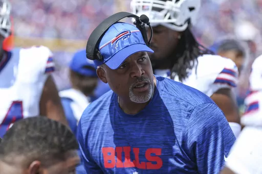 Buffalo Bills assistant head coach/defensive line Eric Washington talks with his players during an NFL pre-season football game against the Indianapolis Colts, Aug. 12, 2023, in Orchard Park, N.Y. Washington is returning to Chicago as the new defensive coordinator for the Bears after he began his NFL coaching career with the franchise. (AP Photo/Gary McCullough, File)