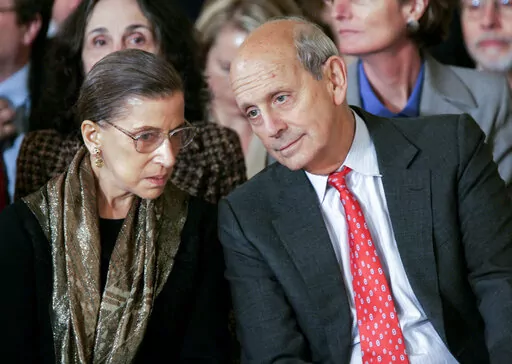 Supreme Court Associate Justices Ruth Bader Ginsburg, left, and Stephen Breyer talk prior to a ceremonial swearing-in ceremony for new Supreme Court Justice Samuel Alito in the East Room of the White House, Feb. 1, 2006. (AP Photo/Gerald Herbert, File)