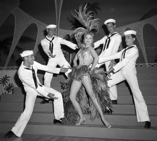 In this May 20, 1957 file photo, Actress Rhonda Fleming blossoms out as a singer and dancer in the first night club appearance of her career at the New Tropicana hotel in Las Vegas. When the Tropicana Las Vegas opened in 1957, Nevada's lieutenant governor at the time turned the key to open the door on what would become a Sin City landmark for more than six decades. Then he threw away the key. “This was to signify that the Tropicana would always stay open,” said historian Michael Green. Six d