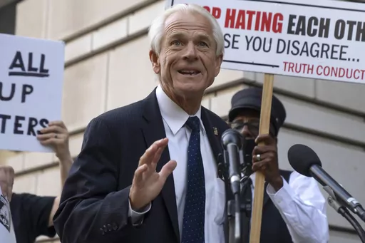 Former White House trade adviser Peter Navarro speaks to the media as he departs federal court, Tuesday, Sept. 5, 2023, in Washington. Navarro was convicted Thursday, Sept. 7, of contempt of Congress charges filed after he was accused of refusing to cooperate with a congressional investigation into the Jan. 6, 2021, attack on the U.S. Capitol. (AP Photo/Mark Schiefelbein, File)