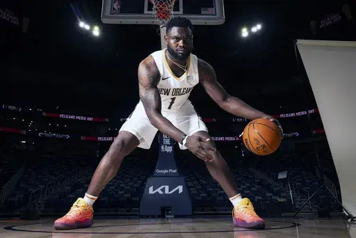 New Orleans Pelicans' Zion Williamson poses during the NBA basketball team's media day at the Smoothie King Center in New Orleans, Monday, Sept. 30, 2024. (Chris Granger/The Times-Picayune/The New Orleans Advocate via AP)