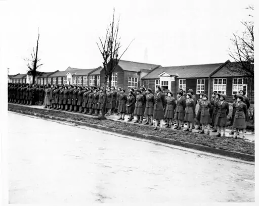 In this photo provided by the U.S. Army Women's Museum, members of the 6888th battalion stand in formation in Birmingham, England, in 1945. On Monday, Feb. 28, 2022, the House voted to award the only all-female, Black unit to serve in Europe during World War II with the Congressional Gold Medal. (U.S. Army Women's Museum via AP, File)