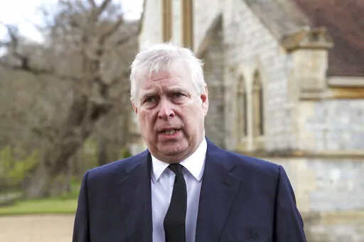 FILE - In this Sunday, April 11, 2021, file photo, Britain's Prince Andrew speaks. during a television interview at the Royal Chapel of All Saints at Royal Lodge, Windsor, England, Sunday, April 11, 2021. A lawsuit by an American who claims Prince Andrew sexually abused her when she was 17 might have to be thrown out because she no longer lives in the U.S., lawyers for the Prince said in a court filing Tuesday, Dec. 28, 2021. (Steve Parsons/Pool Photo via AP, File)