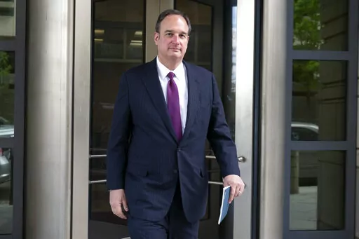 Attorney Michael Sussmann leaves federal court in Washington, April 27, 2022. A criminal case brought by special counsel John Durham, the prosecutor appointed to investigate potential government wrongdoing in the early days of the Trump-Russia probe, heads to trial in Washington's federal court on May 16. The case centers on a single false statement that Sussmann, a cybersecurity lawyer who represented the Hillary Clinton presidential campaign in 2016, is alleged to have made to the FBI during a