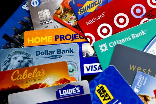 In this Jan. 31, 2018, photo, an assortment of credit cards and rewards cards are shown in Zelienople, Pa. Using the right credit cards for your purchases can help you save money and maximize your benefits. But there are many times a credit card can be the wrong fit for a specific purchase or goal. Here are eight mistakes not to make when it comes to using credit cards.  (AP Photo/Keith Srakocic, File)