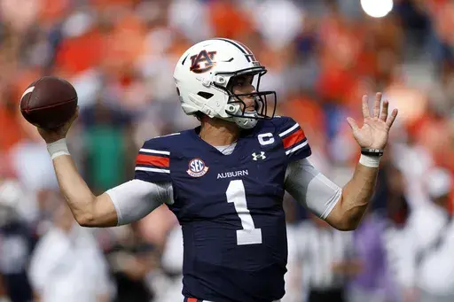 Auburn quarterback Payton Thorne throws a pass during the first half of an NCAA college football game against Vanderbilt, Saturday, Nov. 2, 2024, in Auburn, Ala. (AP Photo/ Butch Dill)