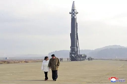 This photo provided on Nov. 19, 2022, by the North Korean government shows North Korean leader Kim Jong Un, right, and his daughter inspect the site of a missile launch at Pyongyang International Airport in Pyongyang, North Korea, Friday, Nov. 18, 2022. North Korea’s state media said its leader Kim oversaw the launch of the Hwasong-17 missile, a day after its neighbors said they had detected the launch of an ICBM potentially capable of reaching the continental U.S. Independent journalists were