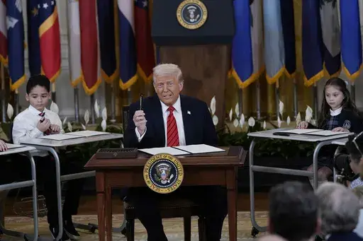 President Donald Trump speaks at an education event and executive order signing in the East Room of the White House in Washington, Thursday, March 20, 2025.(AP Photo/Jose Luis Magana)