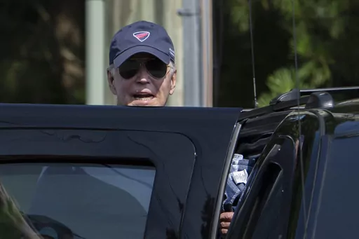 President Joe Biden responds to reporters as he gets in to his presidential vehicle in Rehoboth Beach, Del., Wednesday, Aug. 2, 2023. (AP Photo/Manuel Balce Ceneta)