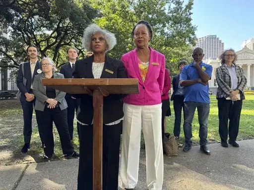 Gail LeBoeuf and Barbara Washington, co-founders of the environmental justice organization Inclusive Louisiana and plaintiffs in a case alleging environmental racism in St. James Parish, Louisiana, speak at a press conference after a hearing for their case at the Fifth Circuit Court of Appeals in New Orleans on Monday, Oct. 7, 2024. (AP/Jack Brook)