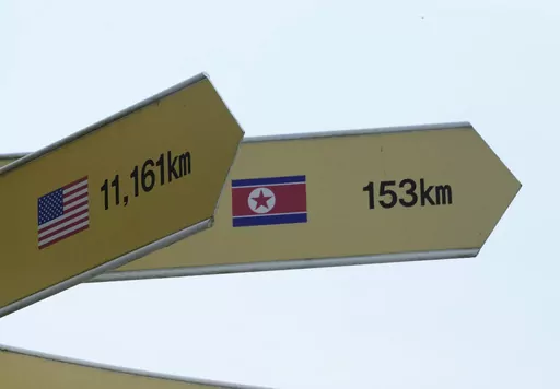 Destination signs to North Korea's capital Pyongyang and the United States are seen at the Imjingak Pavilion in Paju, South Korea, near the border with North Korea, Thursday, July 20, 2023. North Korea wasn't responding Thursday to U.S. attempts to discuss the American soldier who bolted across the heavily armed border and whose prospects for a quick release are unclear at a time of high military tensions and inactive communication channels. (AP Photo/Ahn Young-joon)