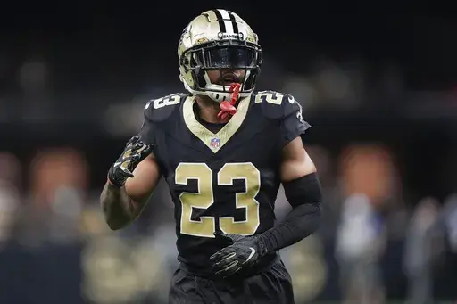 New Orleans Saints cornerback Marshon Lattimore (23) warms up before an NFL football game against the Carolina Panthers in New Orleans, Sept. 8, 2024. (AP Photo/Gerald Herbert, File)