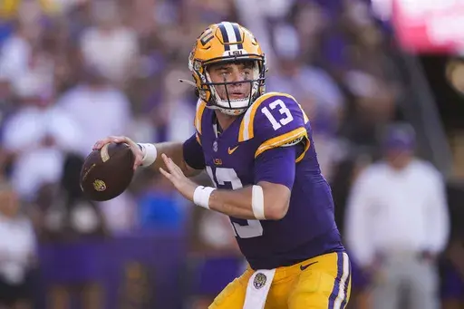 LSU quarterback Garrett Nussmeier (13) drops back to pass in the second half of an NCAA college football game against UCLA in Baton Rouge, La., Saturday, Sept. 21, 2024. LSU won 34-17. (AP Photo/Gerald Herbert)