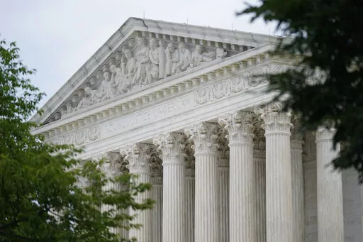 The U.S. Supreme Court building in Washington, Monday, June 27, 2022. The Supreme Court has temporarily blocked a court order that would have forced Yeshiva University to recognize an LGBTQ group as an official campus club. The court acted Friday, Sept. 9, in a brief order signed by Justice Sonia Sotomayor that indicated the court would have more to say on the topic at some point. (AP Photo/Patrick Semansky, File)