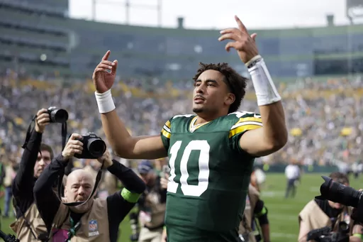 Green Bay Packers quarterback Jordan Love (10) celebrates after an NFL football game against the New Orleans Saints Sunday, Sept. 24, 2023, in Green Bay, Wis. The Packers won 18-17. (AP Photo/Matt Ludtke)