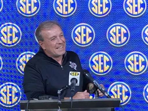 Texas A&M coach Jimbo Fisher addresses a new conference in Destin, Fla., Wednesday, June, 01, 2022. A jovial Fisher said repeatedly on Wednesday he was “moving on” from the war of words between he and his former boss that sprinkled soap-opera drama on the Southeastern Conference's spring meetings this week. (AP Photo/Ralph Russo)