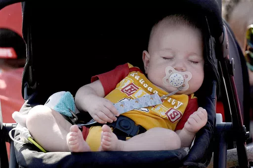 A baby sleeps July 23, 2023, in St. Joseph, Mo. Liam and Olivia have for the fifth year topped the list of top baby names for brand new boys and girls in the U.S., according to the Social Security Administration's list released Friday, May 10, 2024. And Mateo joins the top 10 baby names list for the first time. (AP Photo/Charlie Riedel, File)