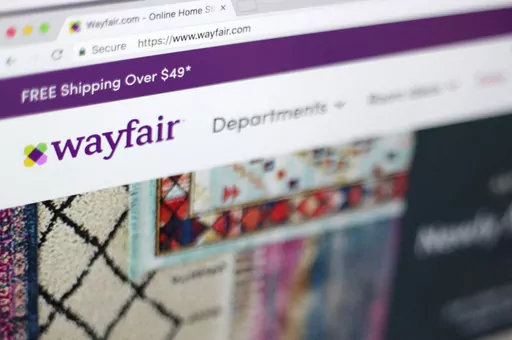 FILE- This April 17, 2018, file photo shows the Wayfair website on a computer in New York. More than a half a million beds sold at retailers like Walmart and Wayfair are under recall because they can break during use, which has resulted in dozens of injuries. The recall impacts several different models and sizes of upholstered low profile standard and platform beds from Home Design, Inc. (AP Photo/Jenny Kane, File)