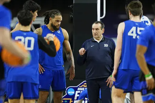 Duke head coach Mike Krzyzewski talks during practice for the men's Final Four NCAA college basketball tournament, Friday, April 1, 2022, in New Orleans. (AP Photo/David J. Phillip)