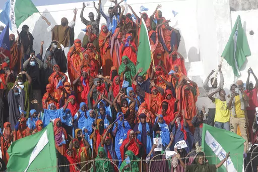 Residents and officials lead a demonstration supporting the government at Banadir stadium, Mogadishu, Thursday Jan. 12, 2023. The government rally encouraged an uprising against the al-Shabab group amid a month long military offensive. (AP Photo/Farah Abdi Warsameh)
