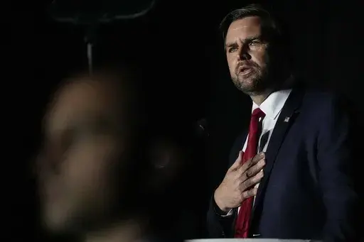 Republican vice presidential nominee Sen. JD Vance, R-Ohio, speaks during the Georgia Faith and Freedom Coalition's dinner at the Cobb Galleria Centre, Monday, Sept. 16, 2024, in Atlanta. (AP Photo/Mike Stewart)
