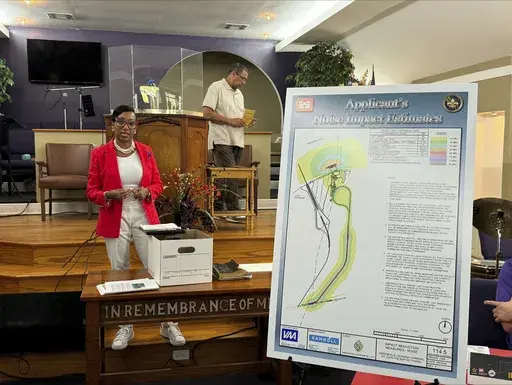 Lynda Van Davis, Greenfield's counsel and head of external affairs, announces that the company is "ceasing all plans" to build a grain export facility in the historic Black community of Wallace, La., in St. John the Baptist Parish, Tuesday, Aug. 6, 2024. (AP Photo/Jack Brook)