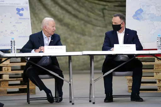 President Joe Biden and Polish President Andrzej Duda participate in a roundtable on the humanitarian response to the Russian invasion of Ukraine, Friday, March 25, 2022, in Jasionka, Poland. (AP Photo/Evan Vucci)