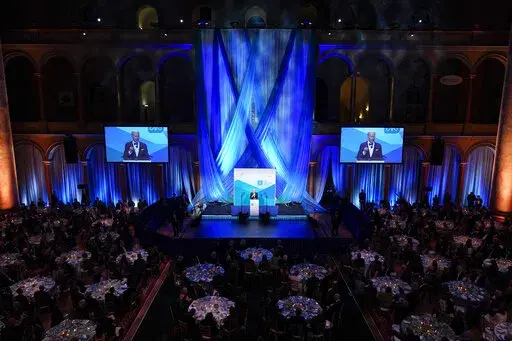 President Joe Biden speaks at the The Ireland Funds National Gala at the National Building Museum, Wednesday, March 16, 2022, in Washington. (AP Photo/Patrick Semansky)