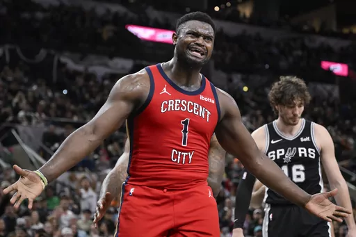 New Orleans Pelicans' Zion Williamson (1) gestures to a referee during the second half of an NBA basketball game against the San Antonio Spurs, Friday, Feb. 2, 2024, in San Antonio. (AP Photo/Darren Abate)