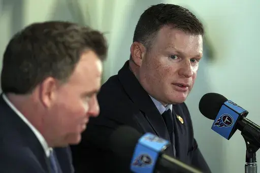 Tennessee Titans President of Football Operations Chad Brinker, right, speaks during a news conference with the team's new general manager Mike Borgonzi, left, at the NFL football team's training facility Wednesday, Jan. 22, 2025, in Nashville, Tenn. (AP Photo/George Walker IV)