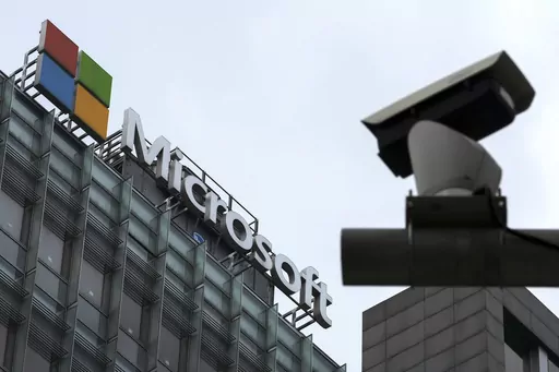 A security surveillance camera is seen near the Microsoft office building in Beijing, July 20, 2021. State-backed Chinese hackers have been targeting U.S. critical infrastructure and could be laying the technical groundwork for the potential disruption of critical communications between the U.S. and Asia during future crises, Microsoft said Wednesday, May 24, 2023. (AP Photo/Andy Wong, File)