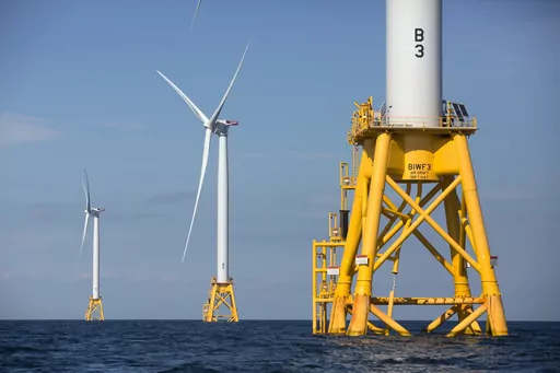 Three wind turbines stand in the water off Block Island, R.I, the nation's first offshore wind farm, Aug. 15, 2016. Four tracts of federal Gulf of Mexico waters of the coasts of Texas and Louisiana, ranging in size from nearly 57,000 acres (23,100 hectares) to over 495,000 acres (200,230 hectares), were designated Thursday, Oct. 27, 2023, for development of wind energy by the Biden administration. (AP Photo/Michael Dwyer, File)
