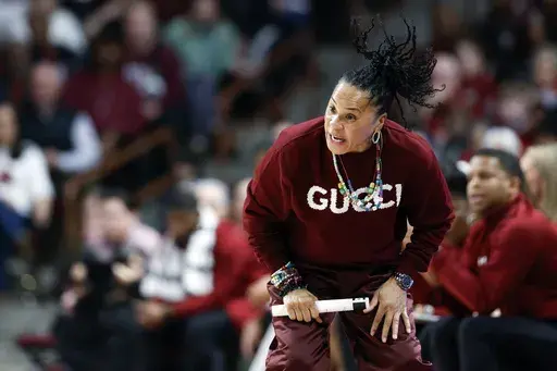 South Carolina head coach Dawn Staley reacts during the first half of an NCAA college basketball game against LSU in Columbia, S.C., Friday, Jan. 24, 2025. (AP Photo/Nell Redmond)