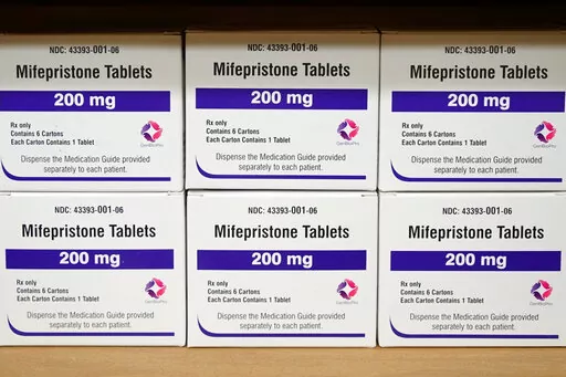 Boxes of the drug mifepristone sit on a shelf at the West Alabama Women's Center in Tuscaloosa, Ala., on March 16, 2022. On Tuesday, Jan. 3, 2023, the Food and Drug Administration finalized a rule change that allows women seeking abortion pills to get them through the mail, replacing a long-standing requirement that they pick up the medicine in person. (AP Photo/Allen G. Breed, File)