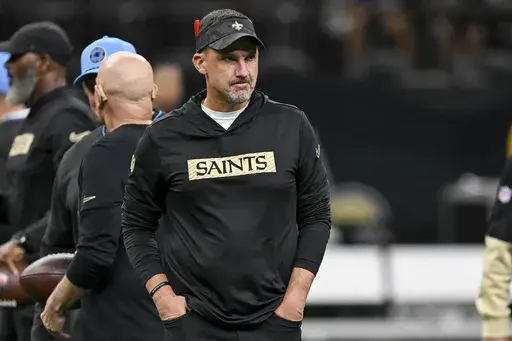 New Orleans Saints head coach Dennis Allen walks across the field before an NFL football game against the Carolina Panthers, Sunday, Sept. 8, 2024, in New Orleans. (AP Photo/Matthew Hinton)