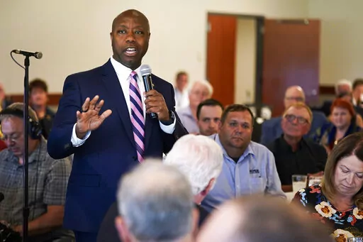 Sen. Tim Scott, R-S.C., speaks during an Iowa GOP reception, Thursday, June 9, 2022, in Cedar Rapids, Iowa. At least a half dozen GOP presidential prospects are planning Iowa visits this summer, forays that are advertised as promoting candidates and the state Republican organization ahead of the fall midterm elections. But in reality, the trips are about building relationships and learning the political geography in the state scheduled to launch the campaign for the party's 2024 nomination. (AP 