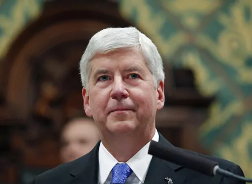Then-Michigan Gov. Rick Snyder delivers his State of the State address at the state Capitol in Lansing, Mich., Jan. 23, 2018. Lawyers for former governor Snyder urged a judge Tuesday, Oct. 11, 2022, to dismiss misdemeanor charges related to the Flint water crisis, a week after another judge took that step with seven other former officials. (AP Photo/Al Goldis, File)