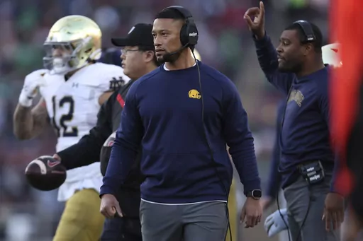 Notre Dame head coach Marcus Freeman watches during the first half of the team's NCAA college football game against Stanford in Stanford, Calif., Saturday, Nov. 25, 2023. (AP Photo/Jed Jacobsohn)