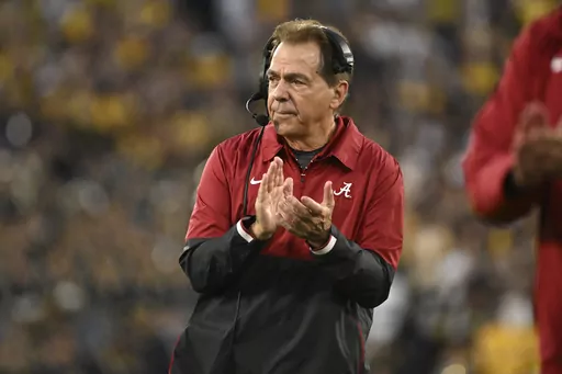 Alabama head coach Nick Saban reacts after running back Jase McClellan (2) scored a touchdown during the second half of the Rose Bowl CFP NCAA semifinal college football game against Michigan Monday, Jan. 1, 2024, in Pasadena, Calif. Nick Saban, the stern coach who won seven national championships and turned Alabama back into a national powerhouse that included six of those titles in just 17 seasons, is retiring, according to multiple reports, Wednesday, Jan. 10, 2024. (AP Photo/Kyusung Gong, Fi