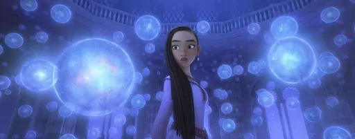 This image released by Disney shows Asha, voiced by Ariana DeBose, in a scene from the animated film "Wish." (Disney via AP)