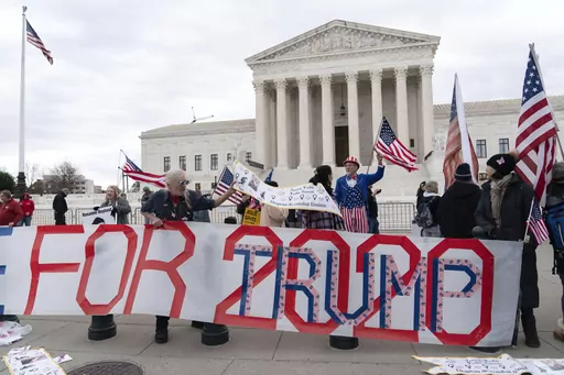 Supporters of former President Donald Trump protest outside of the Supreme Court on the second anniversary of the Jan. 6, riot at the U.S. Capitol, in Washington, Jan. 6, 2023. All eyes are on the Supreme Court in Donald Trump's federal 2020 election interference case. The conservative-majority Supreme Court's next moves could determine whether the former president stands trial in Washington ahead of the November election.(AP Photo/Jose Luis Magana, File)