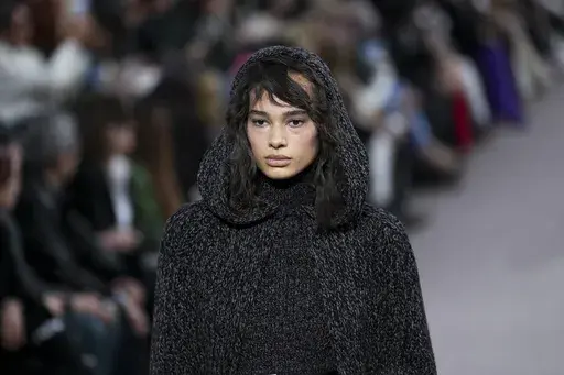 A model wears a creation as part of the Max Mara Fall/Winter 2025-2026 Womenswear collection presented in Milan, Italy, Thursday, Feb. 27, 2025. (AP Photo/Antonio Calanni)