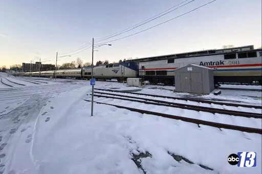 In this image taken from video and provided by WSET-TV, ABC 13, the Amtrak Crescent train number 20 traveling from New Orleans to New York on Tuesday, Jan. 4, 2022, remains in Lynchburg, Va., after inclement weather and power outages in Northern Virginia. (Madison Doner/WSET-TV, ABC 13