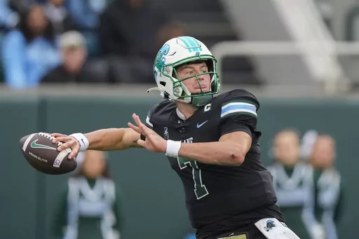 Tulane quarterback Michael Pratt (7) passes in the first half of an NCAA college football game against UTSA in New Orleans, Friday, Nov. 24, 2023. (AP Photo/Gerald Herbert)