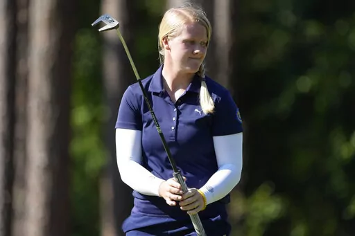 Ingrid Lindblad, of Sweden, watches a putt on the 10th hole during the first round of the U.S. Women's Open golf tournament at the Pine Needles Lodge & Golf Club in Southern Pines, N.C. on Thursday, June 2, 2022. (AP Photo/Chris Carlson)