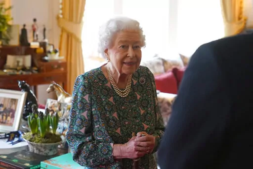 Queen Elizabeth II speaks during an audience at Windsor Castle where she met the incoming and outgoing Defence Service Secretaries, Wednesday Feb. 16, 2022. Buckingham Palace said Sunday, Feb. 20, 2022 that Queen Elizabeth II tested positive for COVID-19, has mild symptoms and will continue with duties. (Steve Parsons, Pool via AP, File)