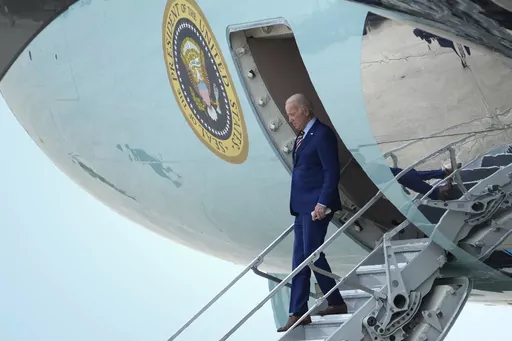 President Joe Biden walks down the steps of Air Force One at Andrews Air Force Base, Md., Thursday, July 6, 2023, after returning from a trip to South Carolina. (AP Photo/Susan Walsh)